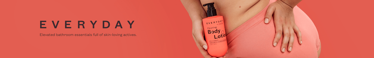 Everyday category banner: a woman in a red top and coral underwear holds an Everyday by frank body Body Lotion bottle. Text reads: Everyday. Elevated bathroom essentials full of skin-loving actives.