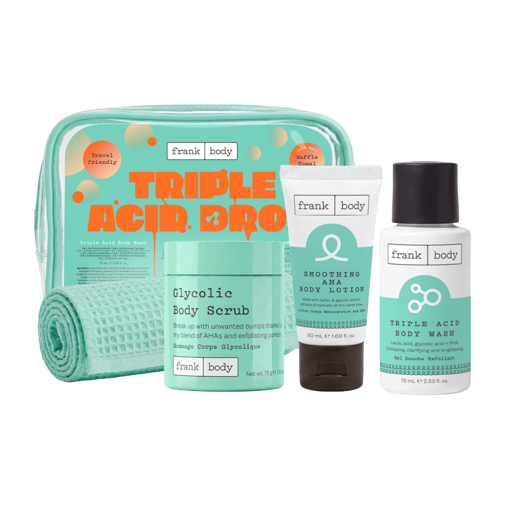 The frank body Triple Acid Drop Kit: a clear mint travel bag and waffle towel with the Glycolic Body Scrub, Smoothing AHA Body Lotion and Triple Acid Body Wash.