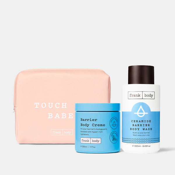The frank body Barrier Bodyguards Kit: Barrier Body Creme and Ceramide Barrier Body Wash with a pink Touch Me Babe pouch.